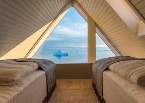 ilimanaq lodge cottage eco lusso e camera con vista su iceberg in groenlandia nella baia di Disko