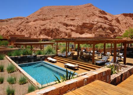 Nayara alto atacama lodge con spa a san pedro de Atacama in Cile. Hotel di lusso con relax in piscina e centro benessere. Posto isolato totalmente integrato alla natura circostante come si vede dalla foto