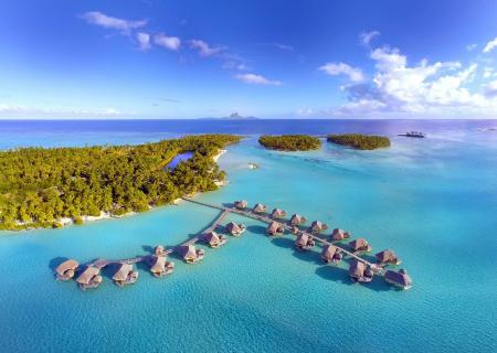 hotel lusso le taha'a a tahiti palafitte polinesiane sul mare dell'oceano pacifico a bora bora